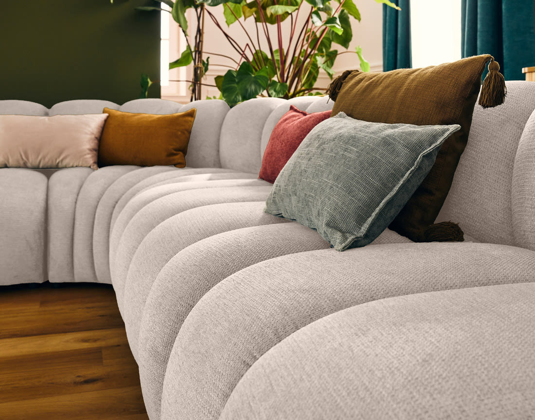 Canapé Modulable Arrondi Tissu Texturé 5 Places Beige - Debbie