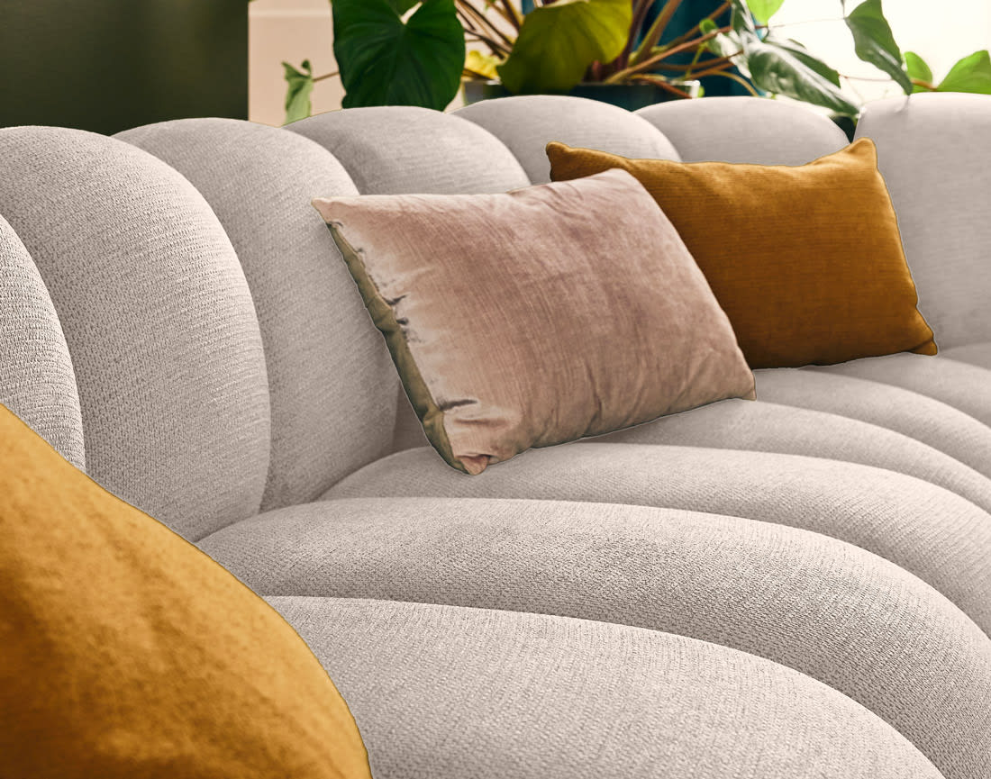Canapé Modulable Arrondi Tissu Texturé 5 Places Beige - Debbie