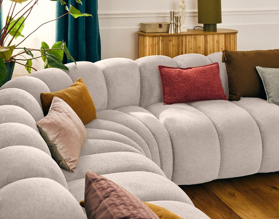 Canapé Modulable Arrondi Tissu Texturé 5 Places Beige - Debbie