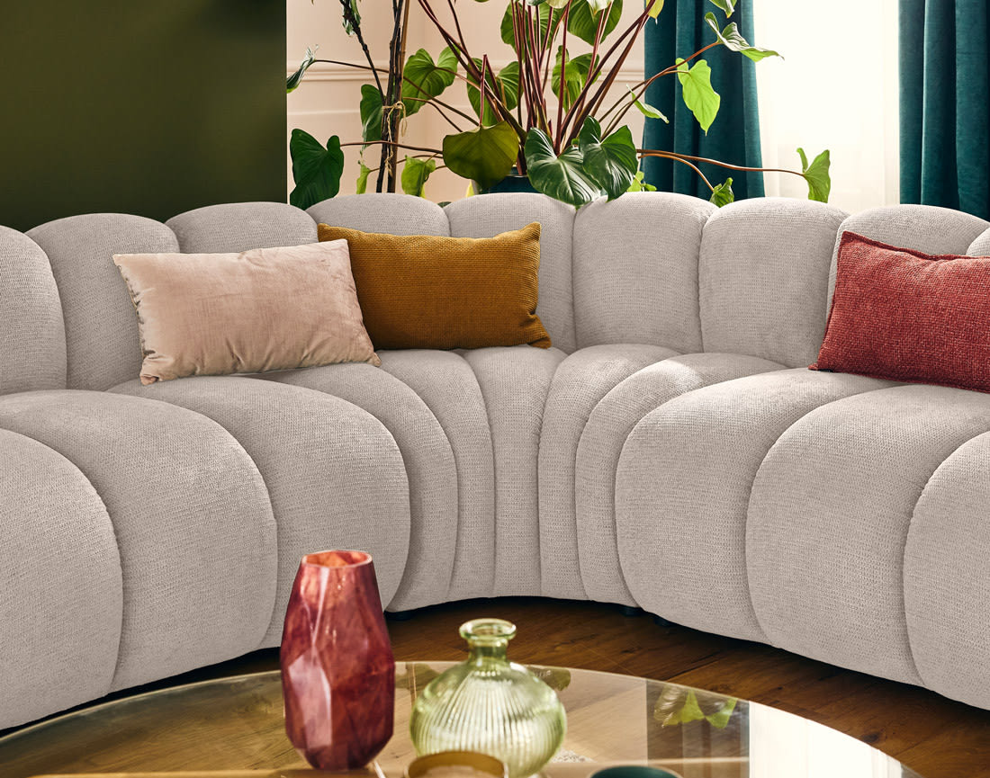 Canapé Modulable Arrondi Tissu Texturé 5 Places Beige - Debbie
